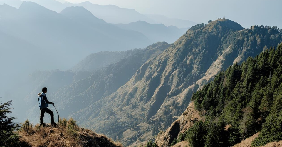 indian-man-hiking-on-mountain-600nw-1895338630
