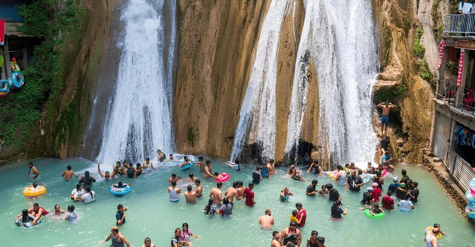 kempty-falls-mussoorie-people-bathing-waterfall